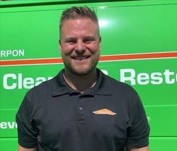 SERVPRO General Manager Anthony is shown, male in black shirt