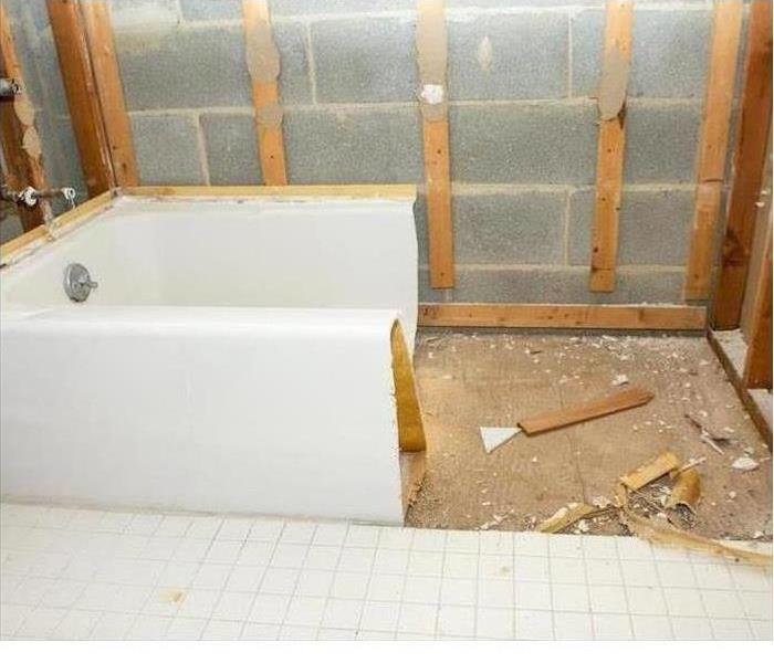 A bathtub is shown during renovation 